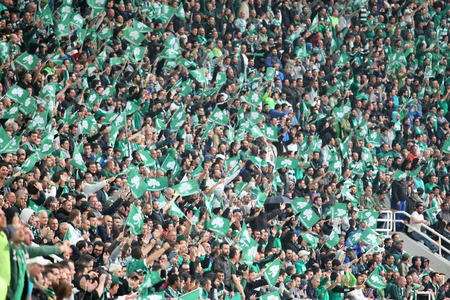 ATHENS, GREECE APRIL 26, 2014 : Panathinaikos fans and supporters light flares during the Greek Cup Final match Paok vs Panathinaikosのeditorial素材