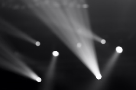 Defocused entertainment concert lighting on stage, bokeh.