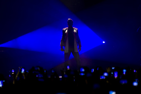 THESSALONIKI, GREECE, MAY 8, 2014: Sakis Rouvas performing live on stage for the Ace of Heart tour at Sports arena in Thessaloniki.のeditorial素材