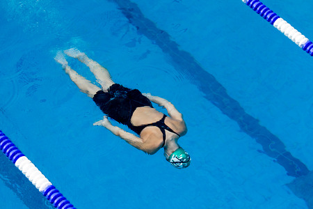 THESSALONIKI, GREECE- MAY 24, 2014: Male and female participants from Balkan countries competing in Makedonian swimming race in Thessaloniki, Greece.のeditorial素材