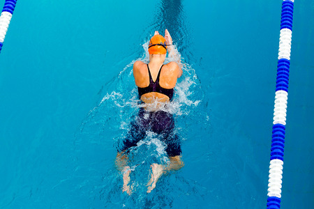 THESSALONIKI, GREECE- MAY 24, 2014: Male and female participants from Balkan countries competing in Makedonian swimming race in Thessaloniki, Greece.のeditorial素材