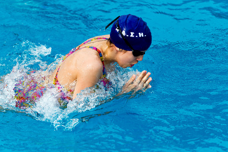THESSALONIKI, GREECE- MAY 24, 2014: Male and female participants from Balkan countries competing in Makedonian swimming race in Thessaloniki, Greece. のeditorial素材
