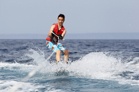 CHALLITHEA, GREECE- MAY 26, 2014: Unidentified man doing water ski on the sea in Kallithea, Greece. -のeditorial素材