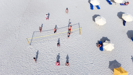 HALKIDIKI, GREECE- MAY 26, 2014: People playing beach volley at the beach of Kallithea, one of the most visited destinations in Greece. Top View のeditorial素材