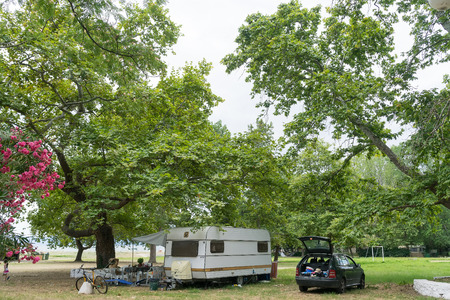 ASPROVALTA, GREECE- JULY 15, 2014: Caravan in organized camping in summertime in Asprovalta, Greece. Many tourists are choosing camping for their summer in Greece.のeditorial素材