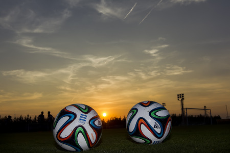 THESSALONIKI, GREECE â AUGUST 26, 2014: Greek Superleague Brazuca (Mundial) ball on the field during the training of PAOK in Thessaloniki, Greece.のeditorial素材