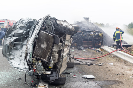 VERIA, GREECE - OCTOBER, 5, 2014:A large truck crashed into a number of cars and 4 people were...