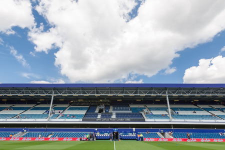 LONDON, ENGLAND - AUG 9, 2014 : Interior view of the empty Loftus Road Stadium before the friendly match QPR vs Paok. Loftus Road Stadium is the home base of the football team QPR.のeditorial素材
