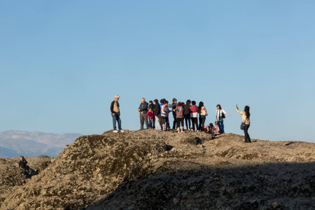 METEORA, GREECE - OCTOBER 12, 2014: Tourists taking pictures during their tour at Meteora, Greece.のeditorial素材