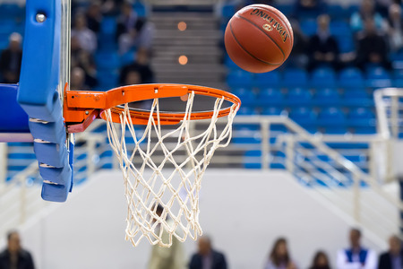 THESSALONIKI, GREECE - NOV 12, 2014: Undefined player hands throwing a ball through the net prior to Eurocup game Paok vs Budocnostのeditorial素材