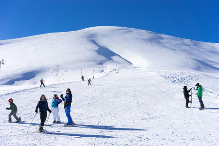 FALAKRO, GREECE - FEBRUARY 11, 2013: Visitors enjoy the snow skiing on the mountain of Falakro, Greece. The ski resort of Falakro Mountain is located in the area of Dramas.のeditorial素材