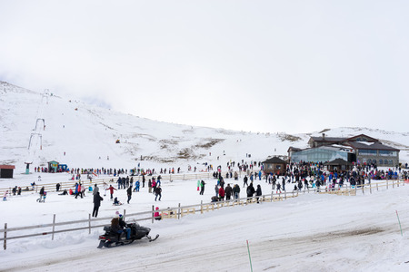 KAIMAKTSALAN, GREECE - FEBRUARY 13, 2014: Skiers enjoy the snow at Kaimaktsalan ski center, in Greece. Recently at the ski center every lift has its automatic ticketing system.のeditorial素材