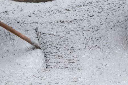 Pouring cement during sidewalk upgradeの写真素材