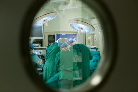 THESSALONIKI, GREECE, FEBRUARY 17, 2015: Team of doctors operates at patient in clinic centerのeditorial素材