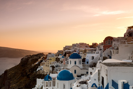 The sunset at Oia village in Santorini island in Greeceの写真素材