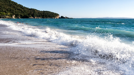 White sand beach and blue sky. Beach background in Greeceの写真素材