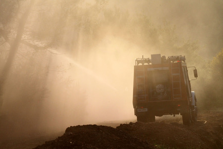 ILIA,GREECE,MAY 21,2015:Pan-European exercise of the Fire Brigade with evacuation and village houses complex, stalking and arson suspects arrested them, rescuing injured firefighters and citizenのeditorial素材