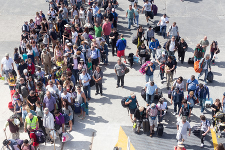 PAROS, GREECE, MAY 17, 2015: Passengers board the ship at the port of Paros in Greece.The Paros is an island in Cyclades that accepts too many tourists every yearのeditorial素材