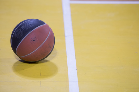 THESSALONIKI, GREECE, JUN 17, 2015: Close-up of a baskeball on the ground during the Greek Basket League game Aris vs Paokのeditorial素材