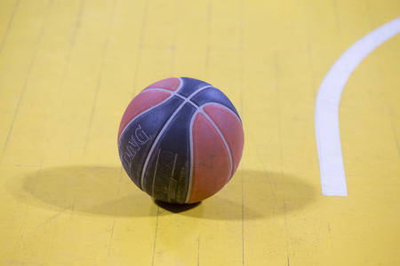 THESSALONIKI, GREECE, JUN 17, 2015: Close-up of a baskeball on the ground during the Greek Basket League game Aris vs Paokのeditorial素材