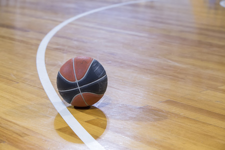 THESSALONIKI, GREECE, JUN 17, 2015: Close-up of a baskeball on the ground during the Greek Basket League game Aris vs Paokのeditorial素材