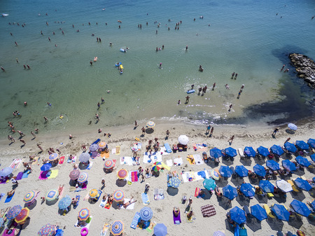 KATERINI, GREECE, JULY 5 2015: Aerial view of the beach of Katerini in Greece. colorful umbrellas and people who swims. Aerial shotのeditorial素材