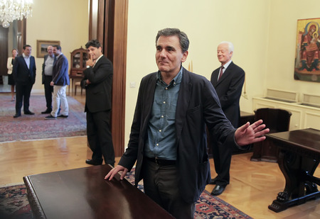 ATHENS, GREECE - JULY 6, 2015: Swearing in of new Greek Finance Minister Euclid Tsakalotosのeditorial素材
