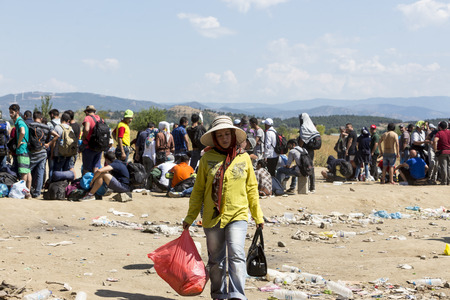 Idomeni, Greece - August 19 , 2015: Hundreds of immigrants are in a wait at the border between Greece and FYROM waiting for the right time to continue their journey from unguarded passagesのeditorial素材