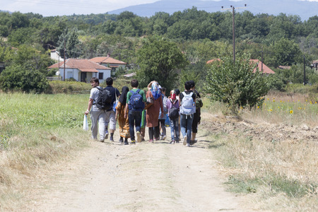 Idomeni, Greece - August 19 , 2015: Hundreds of immigrants are in a wait at the border between Greece and FYROM waiting for the right time to continue their journey from unguarded passagesのeditorial素材