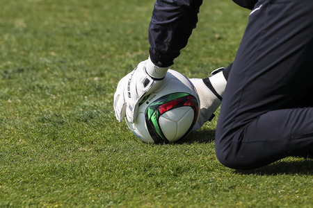Thessaloniki, Greece- June 2, 2015: Goal Keeper of Paok with the ball in his hands during the teamâs training session, in Thessaloniki, Greece.のeditorial素材