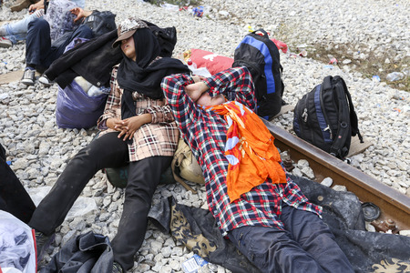Idomeni, Greece - September 24 , 2015: Hundreds of immigrants are in a wait at the border between Greece and FYROM waiting for the right time to continue their journey from unguarded passagesのeditorial素材