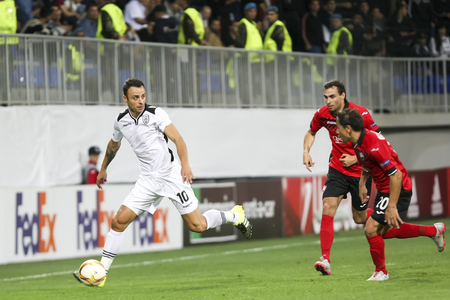 Azerbaijan, Baku - September 17, 2015: Dimitar Berbatov (L) and Ricardinho (R) during the UEFA Europa League game between Qabala and PAOK, in Baku, Azerbaijan.のeditorial素材