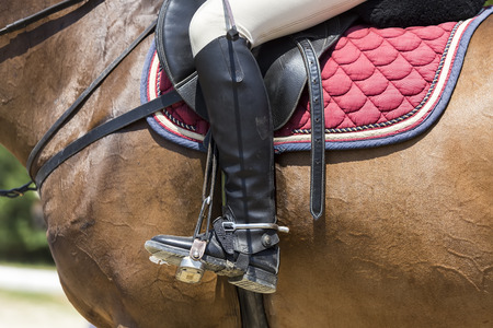 Thessloniki, Greece, June 14, 2015: Close up of the stirrup on the horse during competition matches riding round obstaclesのeditorial素材