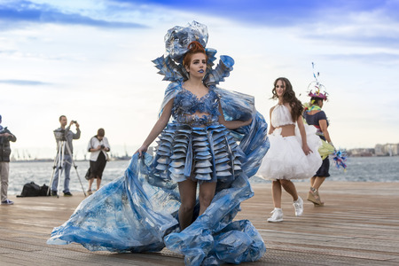 Thessaloniki, Greece, 28 September 2015. Models walk an during  outdoor fashion show with clothing...