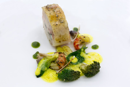 Gourmet dish on a white plate. Food background.の写真素材