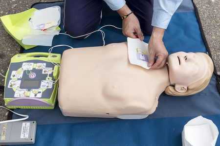 Thessaloniki, Greece, Oktober16 2015: The instructor showing CPR on training doll. Free First Aid, CPR lessons given in the center of Thessaloniki, Greece.のeditorial素材