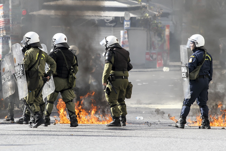 Athens, Greece, November, 12 2015: Clashes have broken out between riot police and youths at a...