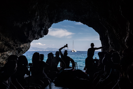 Zakynthos, Greece - August 11, 2015: Tourists visiting the Blue caves on Zakynthos Island in Greeceのeditorial素材