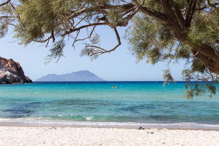 Milos, Greece - September 11, 2015: Tourists kayaking at the Beach in Milos island, Cyclades, Greeceのeditorial素材