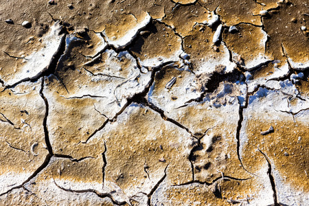 Dry lake bed with natural texture of cracked clay in perspective floor. Death Valley field ....
