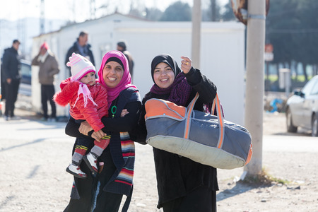 Idomeni, Greece, February 7, 2016: Hundreds of immigrants are in a wait at the border between Greece and FYROM  waiting to cross the borders to FYR of Macedoniaのeditorial素材