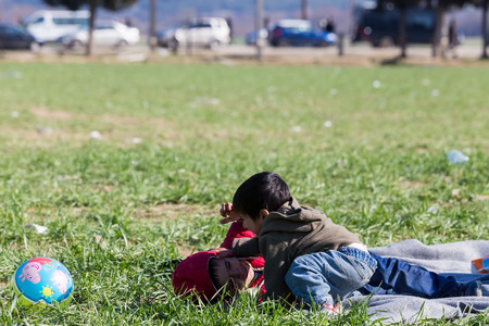 Idomeni, Greece, February 7, 2016: Hundreds of immigrants are in a wait at the border between Greece and FYROM  waiting to cross the borders to FYR of Macedoniaのeditorial素材