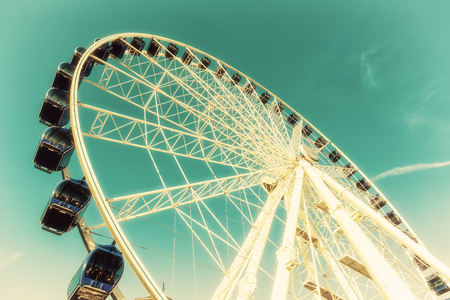 Luna park attraction wheel (soft focus). Cross processed image for vintage lookのeditorial素材