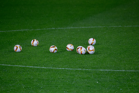 Thessaloniki, Greece - November 25, 2015: Europa League football balls on the field during the training of PAOK in Thessaloniki, Greece.のeditorial素材