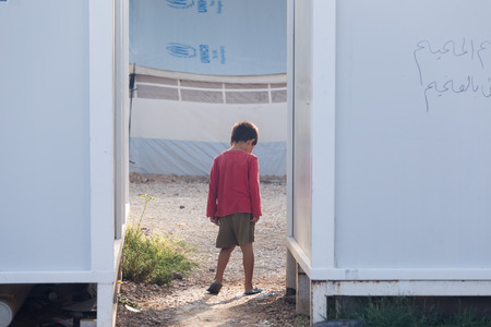 Lagadikia, Greece - August 25, 2016: Children play in the refugee camp of Lagadikia, some 40km North of Thessaloniki, during the visit of UN high commissioner for refugees Filippo Grandiのeditorial素材