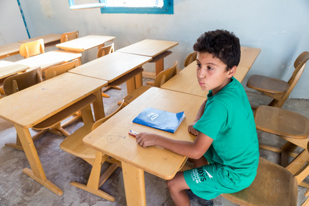 Lagadikia, Greece - August 25, 2016: Children sit in a classroom in the refugee camp of Lagadikia, some 40km North of Thessaloniki, during the visit of UN high commissioner for refugees Filippo Grandiのeditorial素材