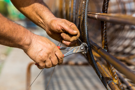 construction workers steel tie.Selective focus. Very shallow Depth of Field, for soft background.の写真素材