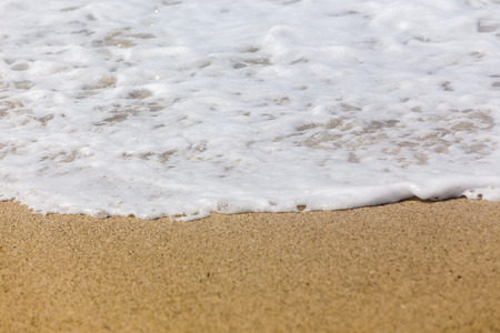 Waves breaking on the shore