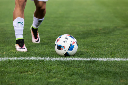 Thessaloniki, Greece - September 3, 2016: Closeup of soccer ball and feet of the player during of match  Aris vs Panathinaikos at Charilaou stadiumのeditorial素材