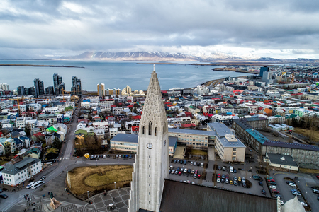 Aerial view of famous Hallgrimskirkja Cathedral and the city of Reykjavik in Iceland. Image taken with action drone cameraのeditorial素材